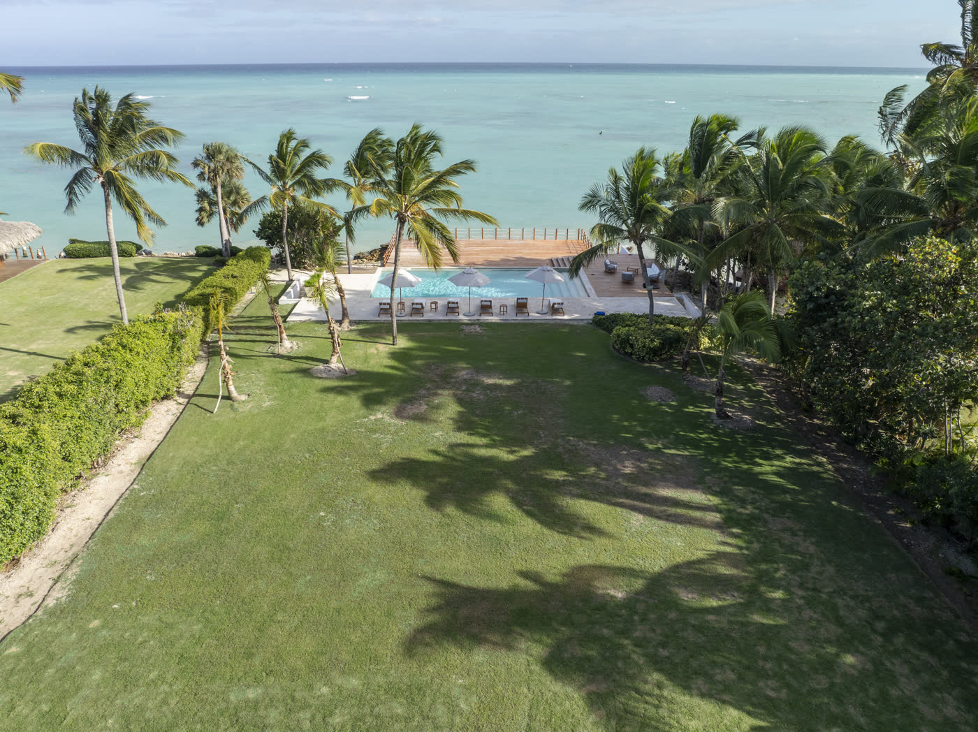 Golden-hour view of a private beachfront estate near Punta Cana